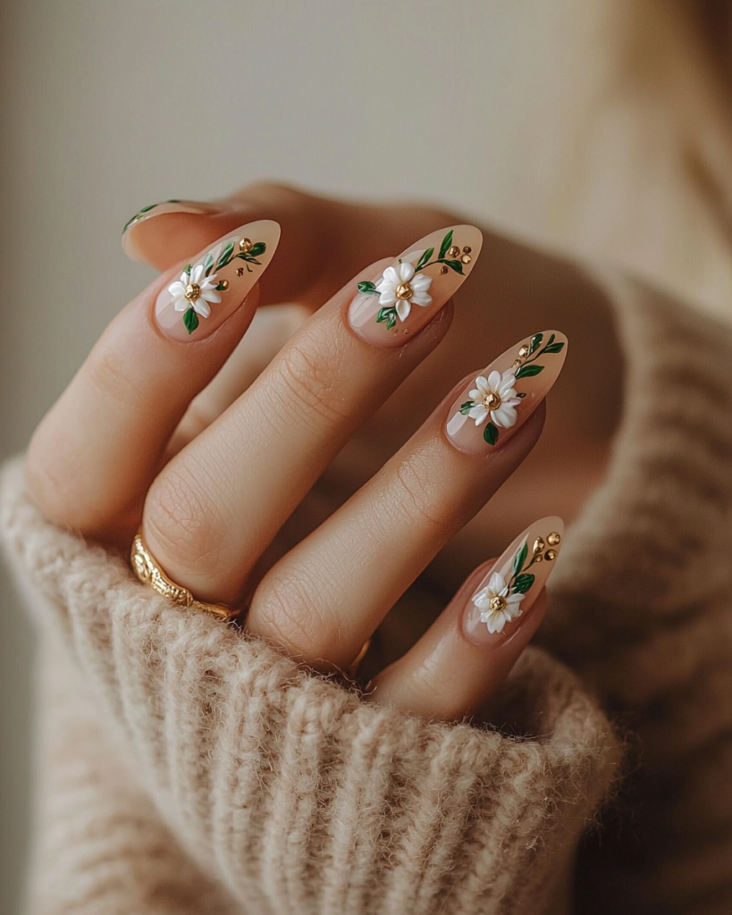 Moody artistic close-up of botanical green and white floral nail art with deep emerald green marble veins, raised 3D white flowers, and glossy water droplets on long almond nails against a dark neutral background